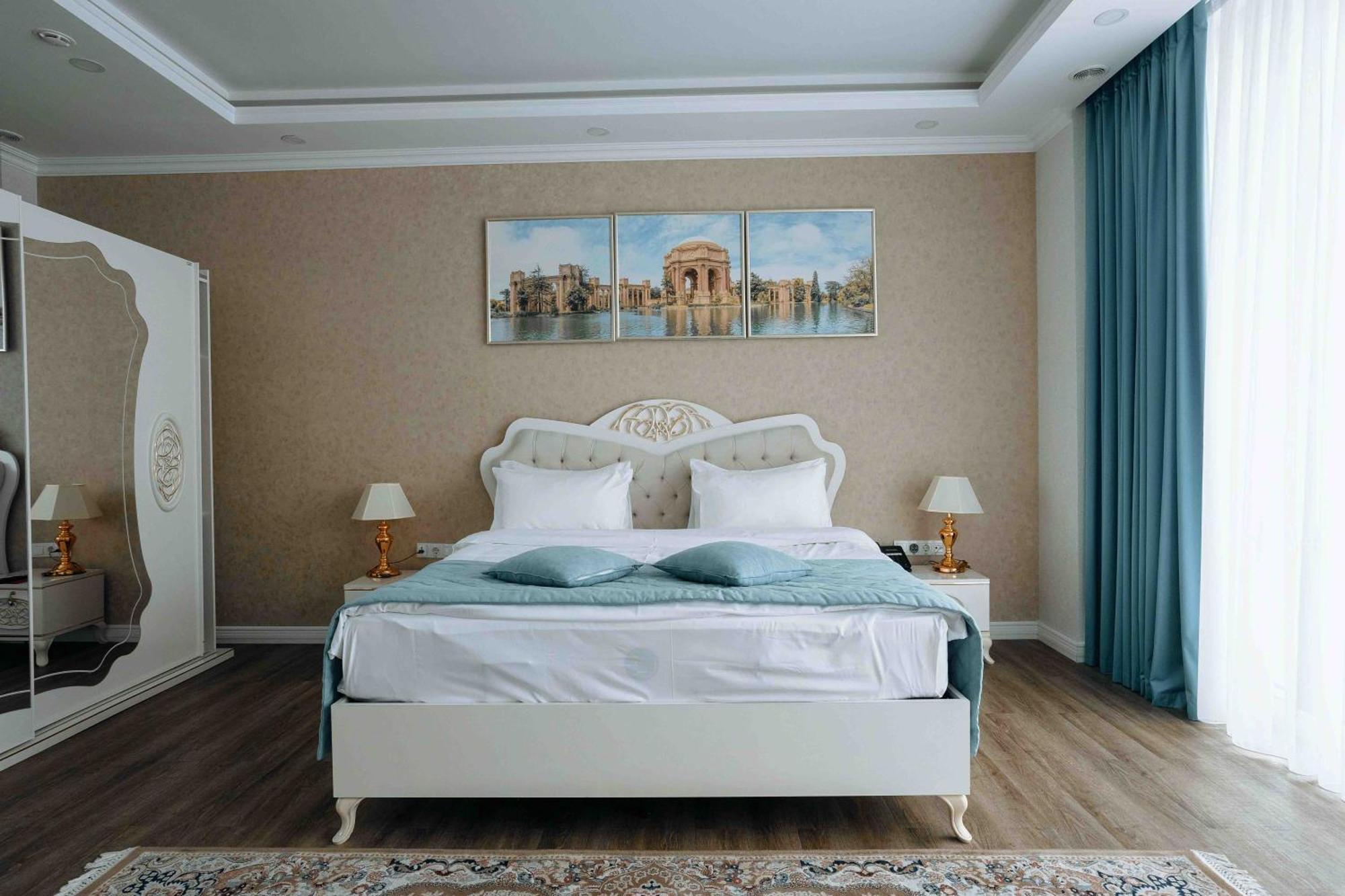 Hotel Ramada By Wyndham Shymkent Exterior foto