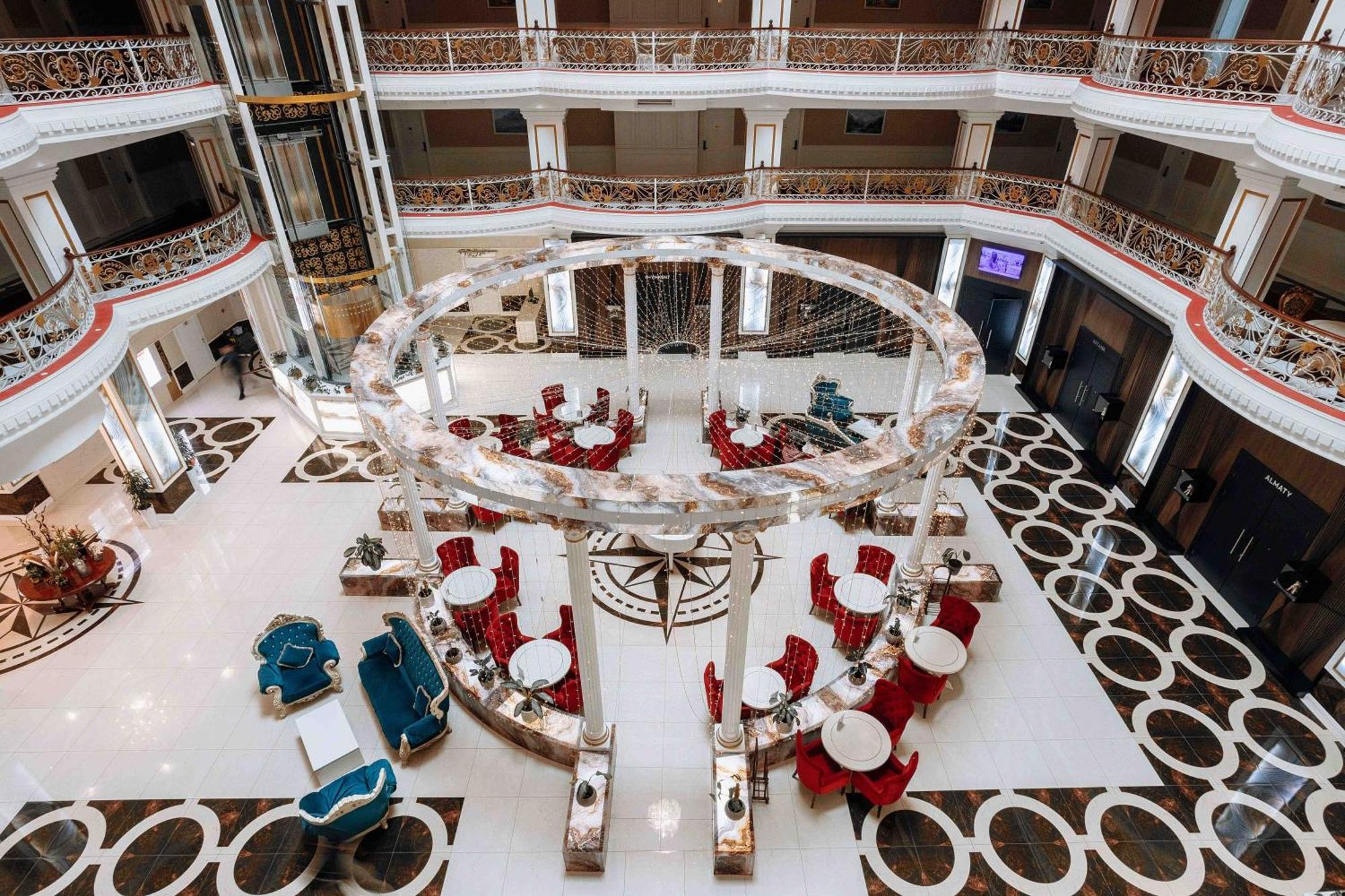 Hotel Ramada By Wyndham Shymkent Exterior foto